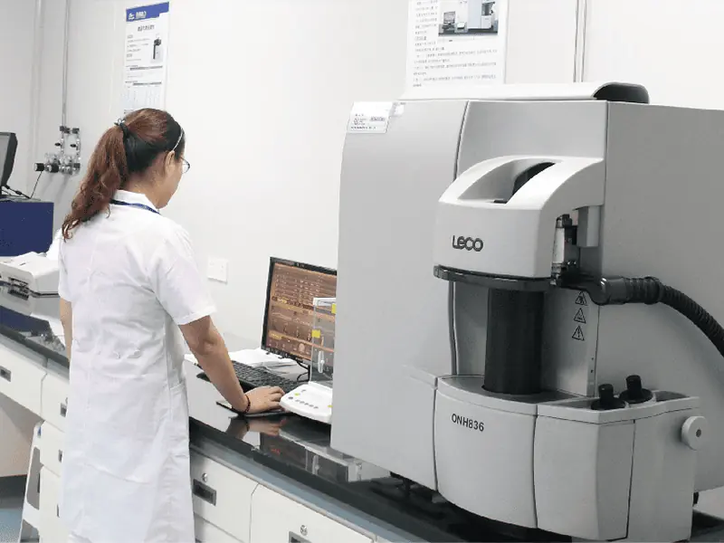 A well-equipped test laboratory with researchers conducting experiments and analyzing data.